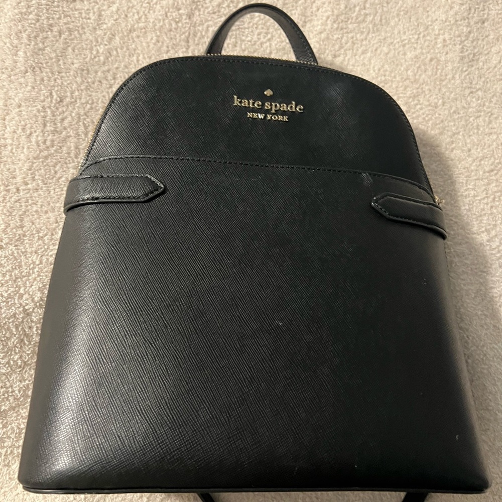 Black Kate Spade saffiano leather back pack.